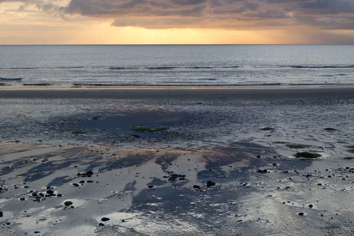 Sundown at Strandhill surfing beach, situated on the west coast of Ireland, facing into the north Atlantic ocean.