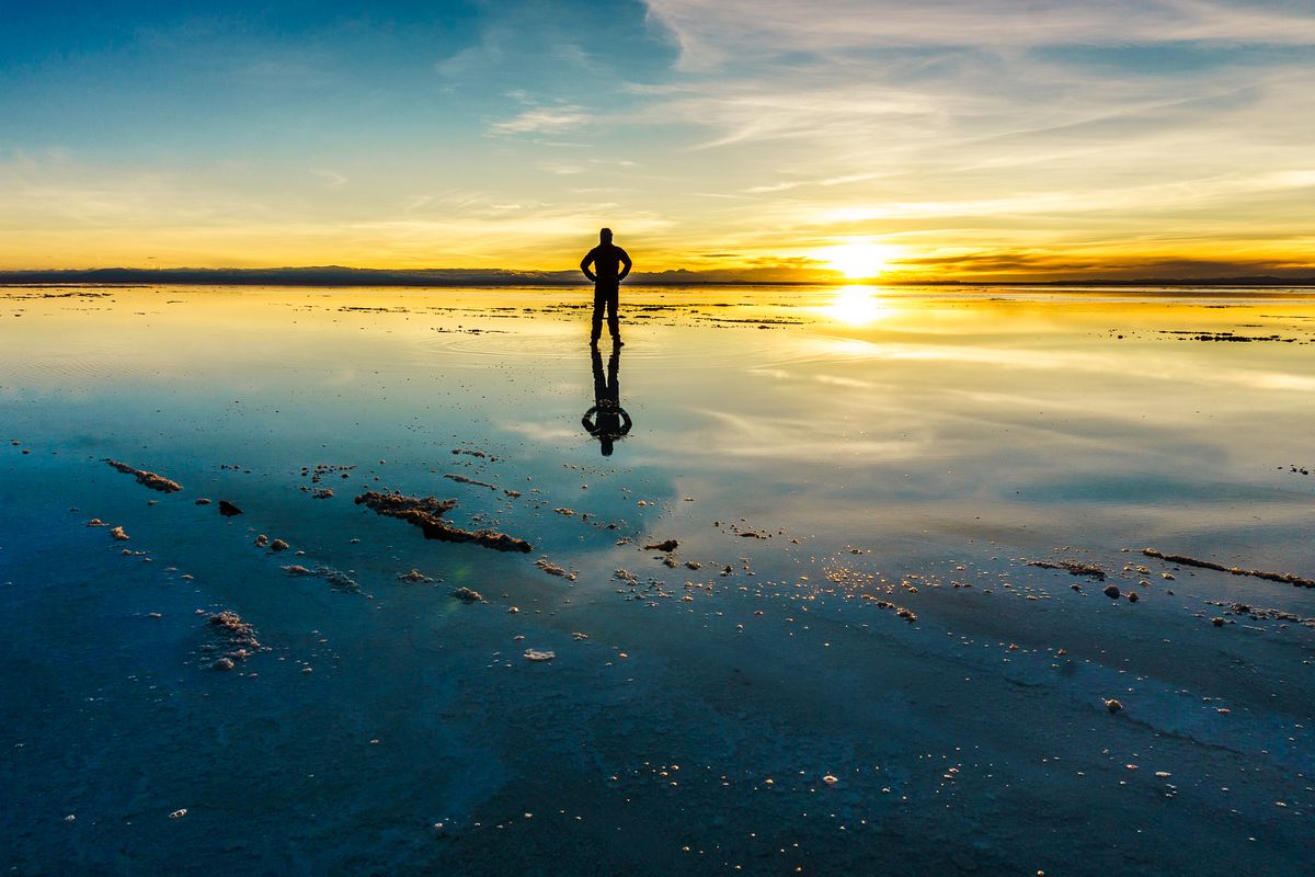 Sunrise at Salar de Uyuni, Boivia. Lucky me, it rained the hole night!